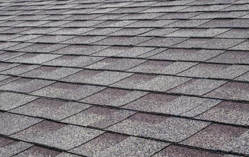 Rowfoot tiles for shallow pitch roofing